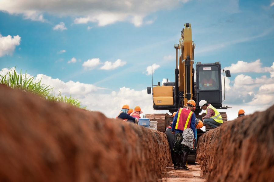Group of worker and construction engineer wear safety uniform excavation water drainage at construction site